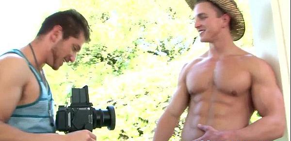  Muscular gay model jerking with photographer